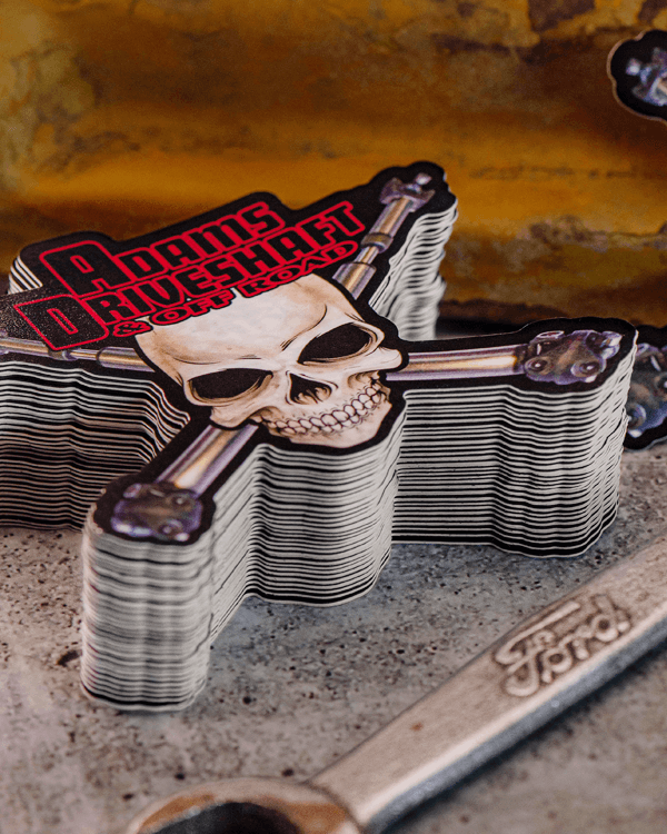 Custom shaped skull and crossbones sticker for Adams Driveshaft printed by Rockin Monkey